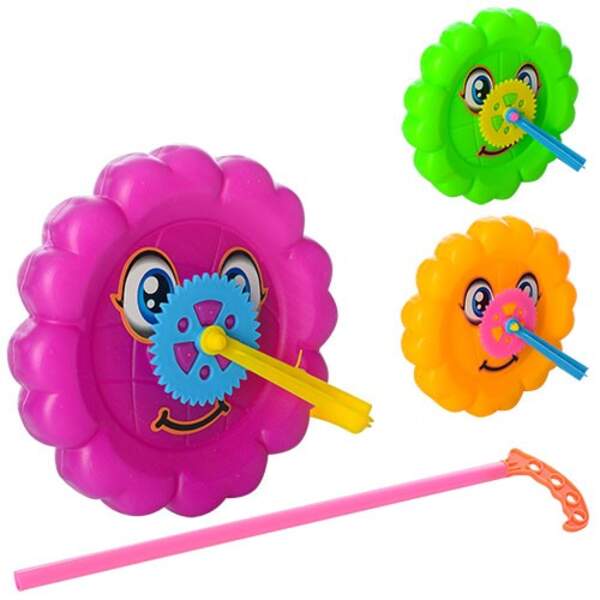 Каталка 4679A (144шт) на палиці, колесо, тріскачка, 3 кольори, в кульці, 12,5-12,5-2,5см (шт.)