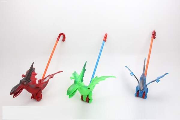 Каталочка 377-2 (1793712) (96шт/2)динозавр,3 види, на паличці, в пакеті 34*30*26см (шт.)