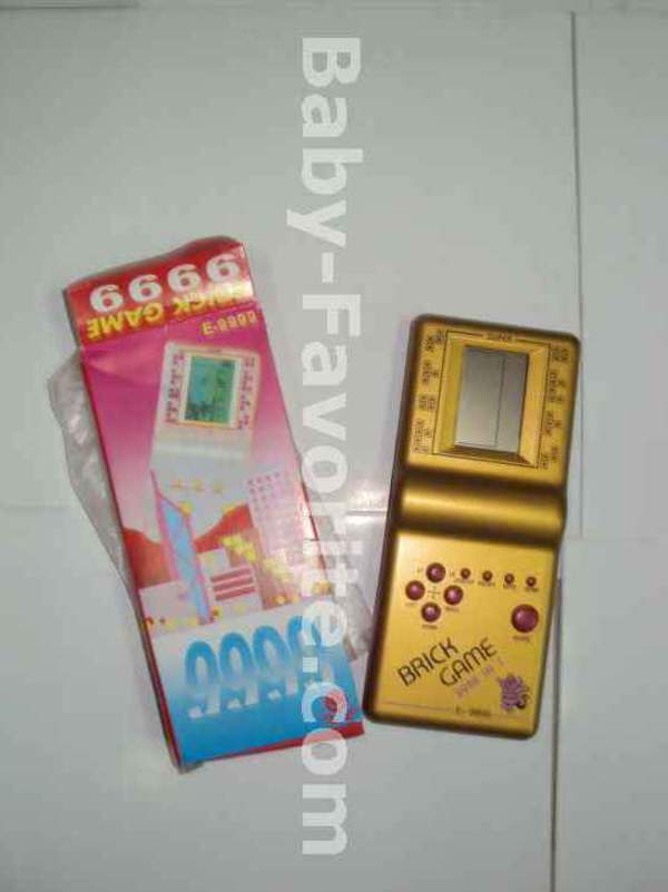 Тетріс E 9999 (144шт) муз, мікс кольорів, на бат-ці, у кор-ці, 8-19-2,5см (шт.)